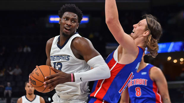 Memphis's Jaren Jackson Jr. tries to get past Kelly Olynyk